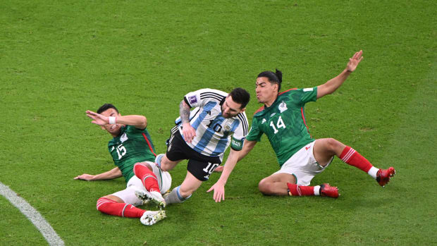 Lionel Messi pictured (center) in action for Argentina against Mexico at the 2022 FIFA World Cup in Qatar